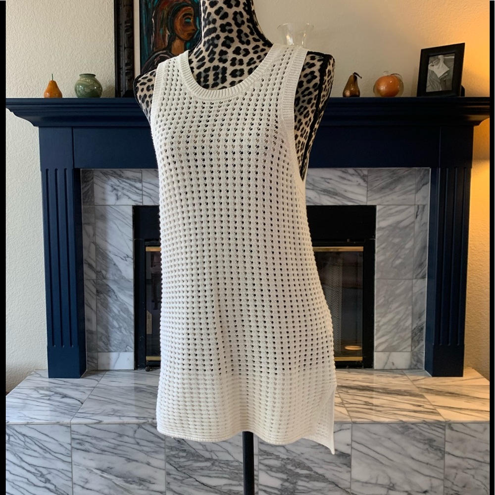 Cream knit vest, excellent condition.